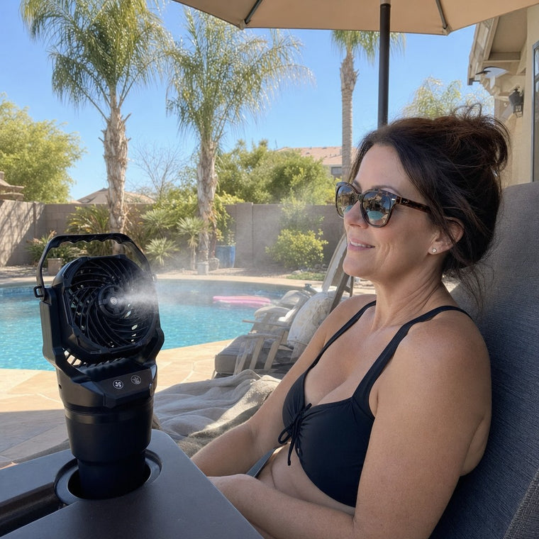 Chill Isle Breeze misting toward a woman by the pool
